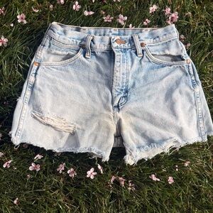 Wrangler size 30 ultra distressed shorts with under bum cutout